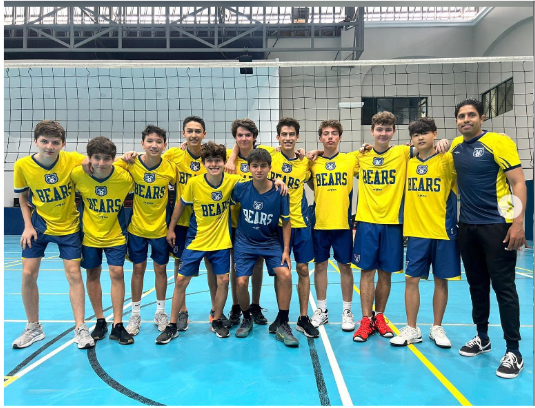 The Colegio Menor boys volleyball team returns to the court for the 2023 season with just one senior on the roster, Santiago Gutierrez, who is pictured here in blue. 